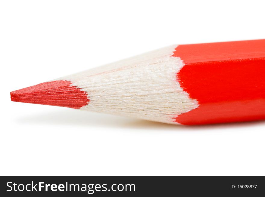 Red pencil isolated on white background close up