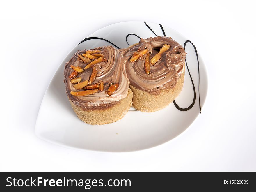 Sweet cappuccino almond roll isolated white background