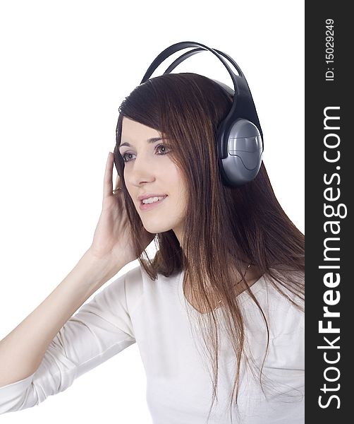 Young woman in headphones listening music