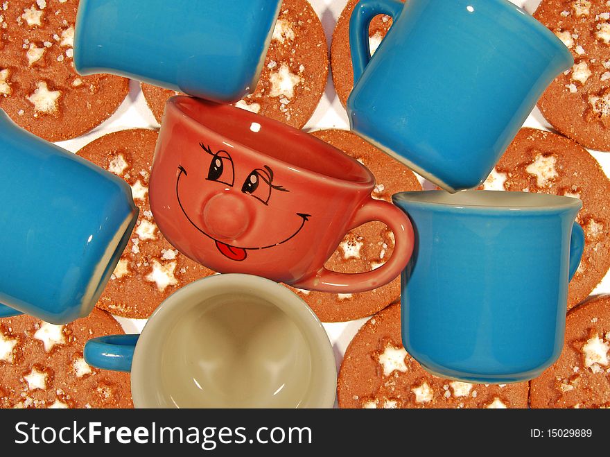 Cup colorful and happy for a good breakfast. Cup colorful and happy for a good breakfast