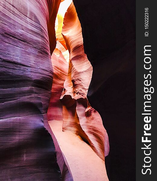 Interior shot of Lower Antelope Canyon. Lower Antelope Canyon, is called HazdistazÃƒÂ­, or & x27;spiral rock arches& x27; by the Navajo, is located several miles from Upper Antelope Canyon