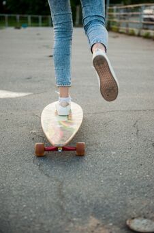Girl With Longboard Wearing Sneakers Shoes In Urban Style Royalty Free Stock Photo