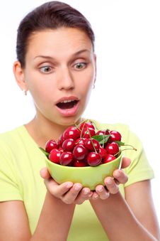 Woman With Crockery Of Cherries In Her Hands. Royalty Free Stock Photos