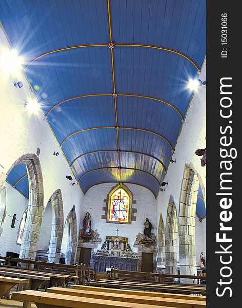Gothic chapel interior in brittany - white walls and blue ceiling. Gothic chapel interior in brittany - white walls and blue ceiling