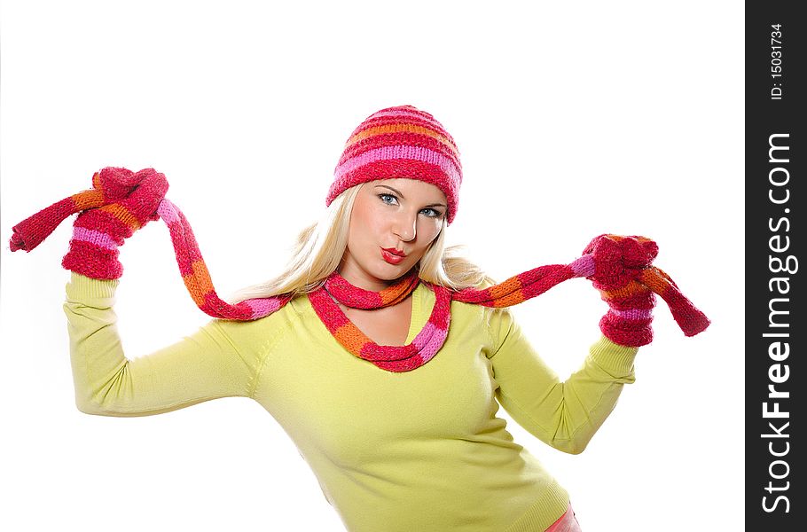 Seasonal portrait of pretty funny woman in hat and gloves smiling. Seasonal portrait of pretty funny woman in hat and gloves smiling