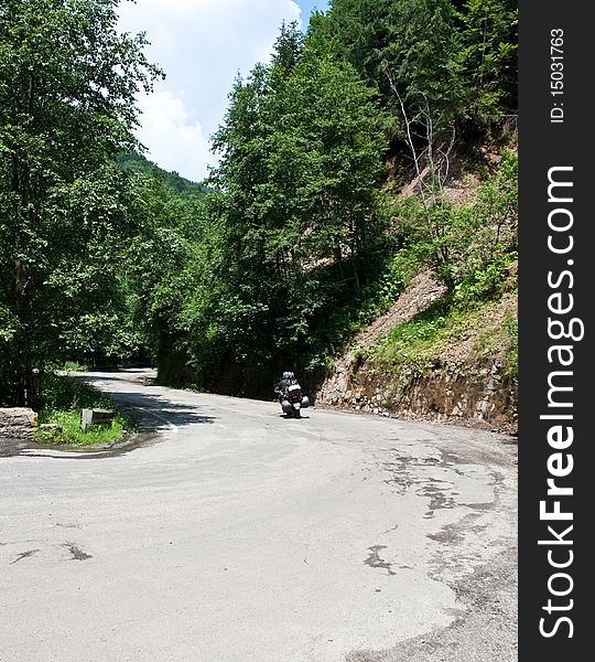 Motorcycle on trecherous mountain road. Motorcycle on trecherous mountain road