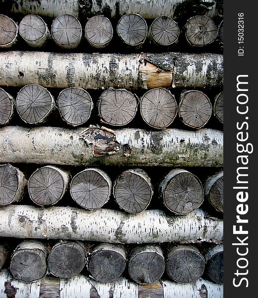 A big pile of birch logs. A big pile of birch logs