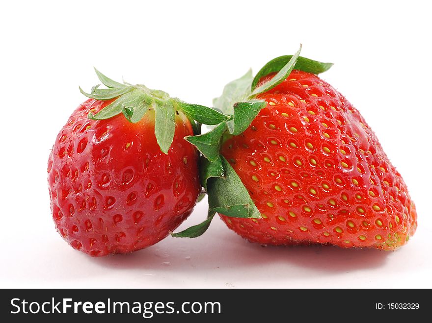 Couple of strawberries on a white background. Couple of strawberries on a white background