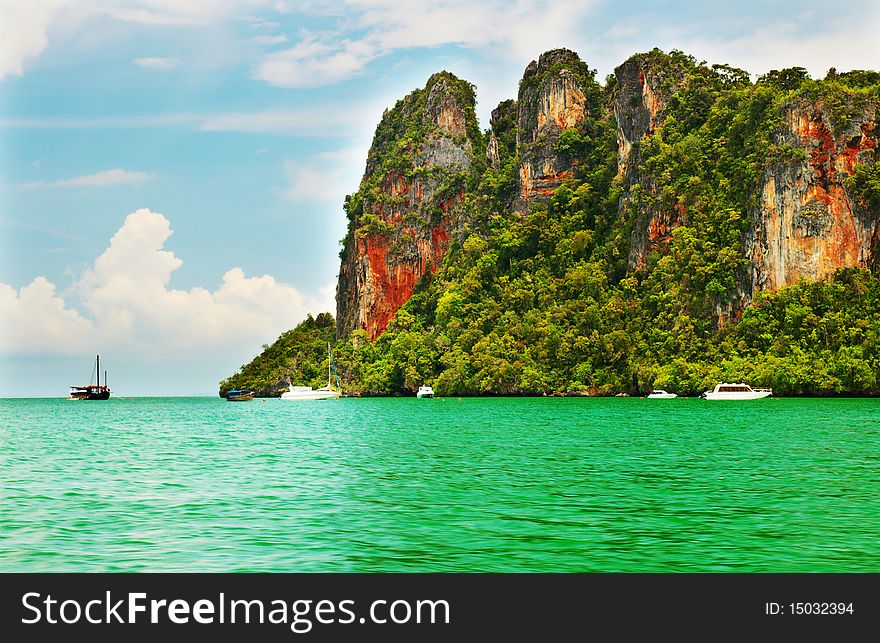 High cliffs on the tropical island. Exotic tropical landscape.