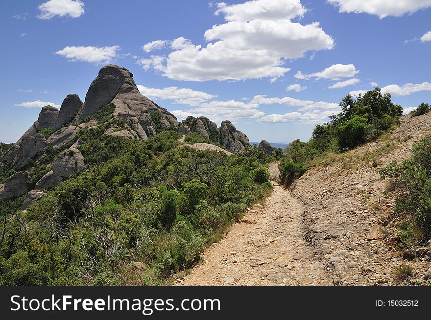 Scenic pathway in Spanish mountains in Barcelona area close to famous Monserrat Monastery. Scenic pathway in Spanish mountains in Barcelona area close to famous Monserrat Monastery
