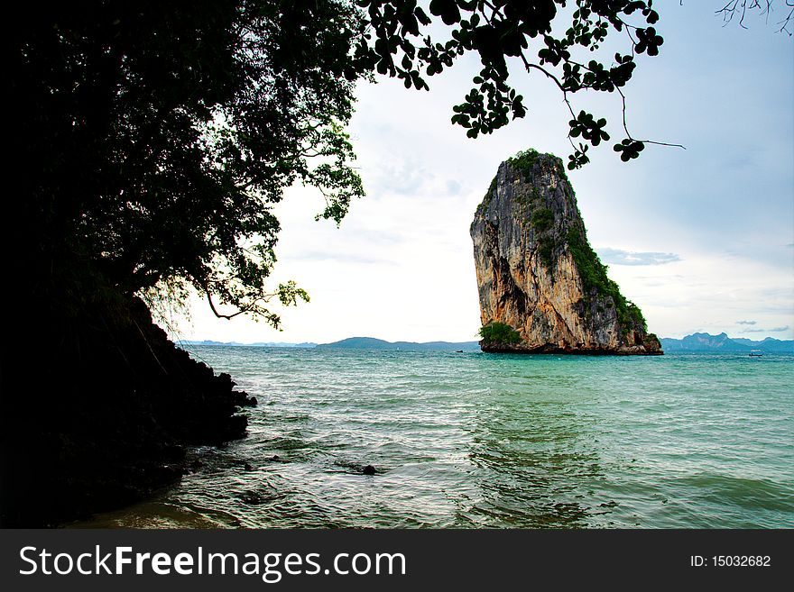 High cliff on Poda island. Exotic tropical landscape. High cliff on Poda island. Exotic tropical landscape.