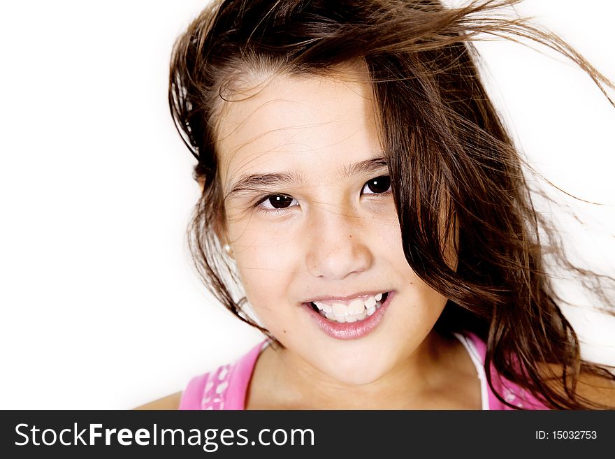 Ten years old girl whit hair up over white background