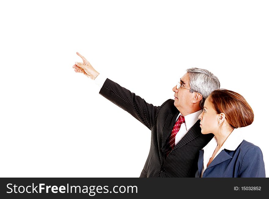 Businessman and businesswoman looking up over white background