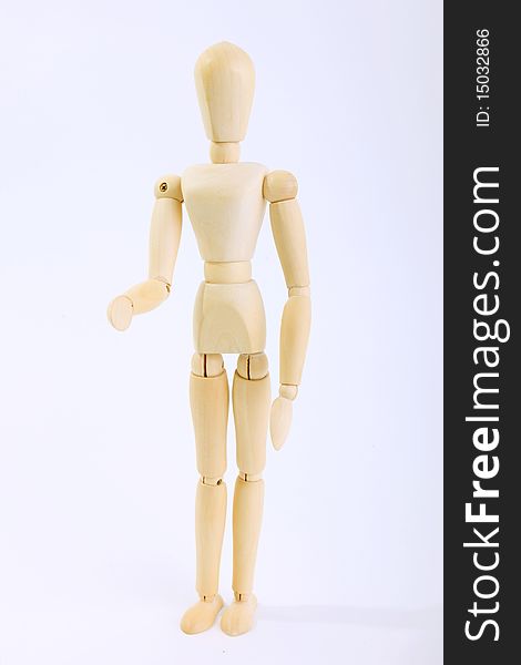 Wooden doll over white background. Expression of greeting