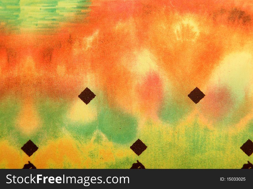 Orange, green, and yellow abstract background. fabric texture. Orange, green, and yellow abstract background. fabric texture