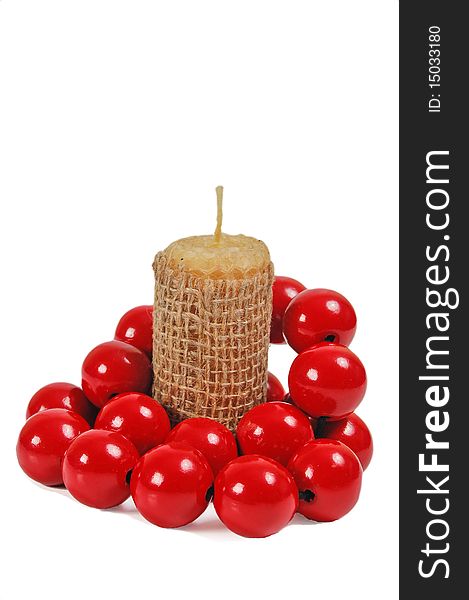 Candle with red beads on white background. Isolate with path.