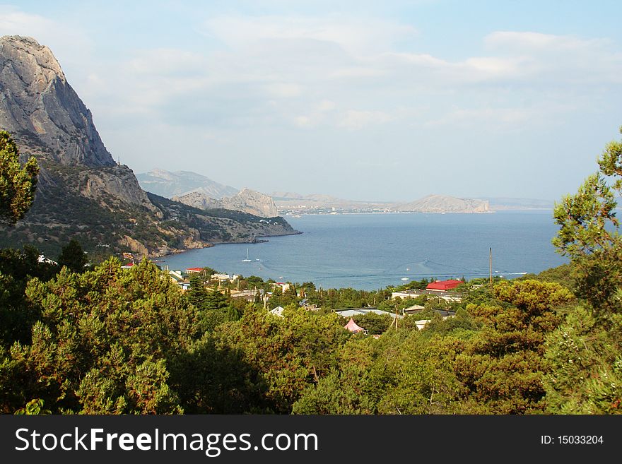 Rocks of the Black Sea coast. Crimea. New. The roofs of the city. Rocks of the Black Sea coast. Crimea. New. The roofs of the city