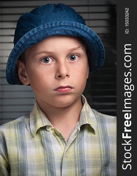 Portrait of the boy with denim hat. Portrait of the boy with denim hat