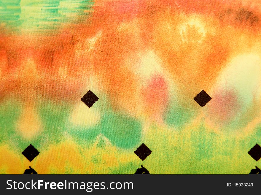 Orange, green and yellow abstract image. Fabric texture. Orange, green and yellow abstract image. Fabric texture
