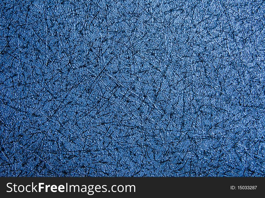 A texture of a blue-black wall paper. A texture of a blue-black wall paper.