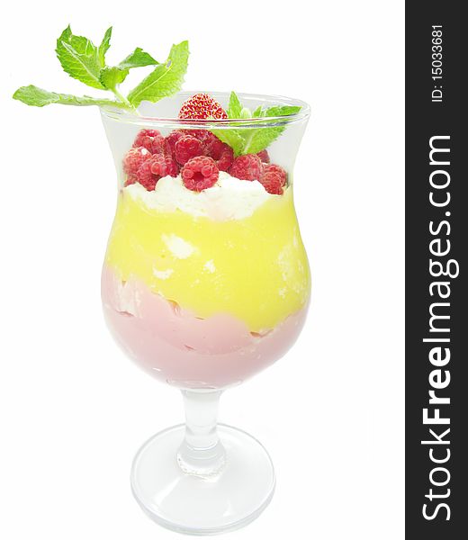 Fruit cocktail with raspberry and strawberry decorated by mint