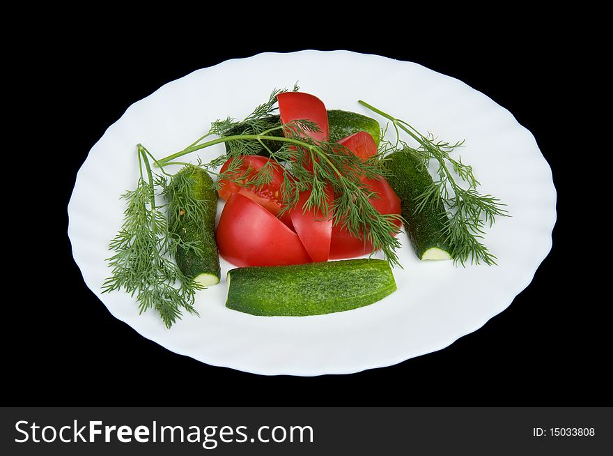 Plate with vegetables over black background