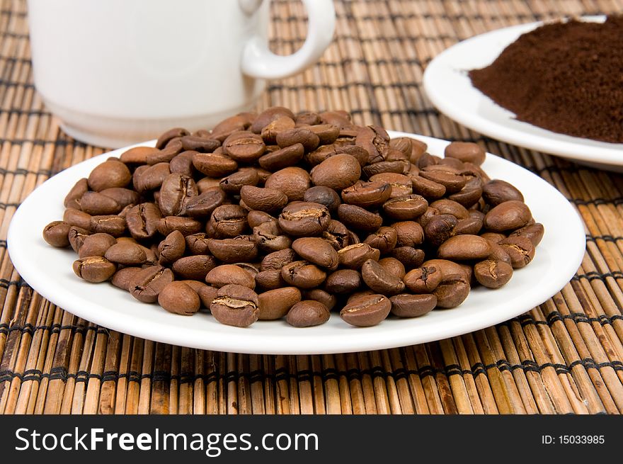 Roasted coffee beans on plate