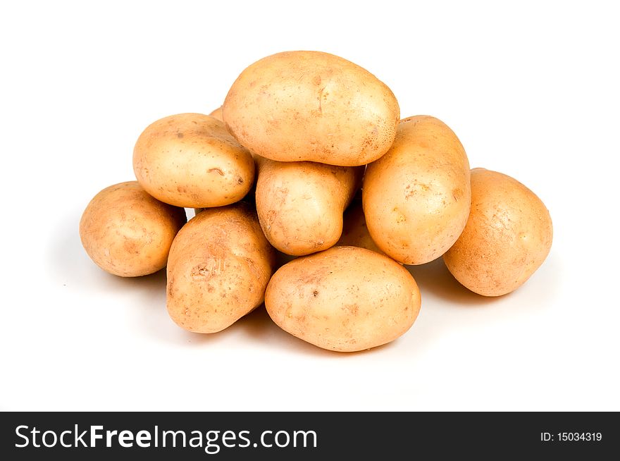 Several potatoes over white background