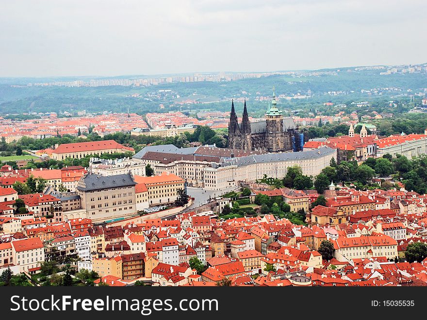 View of Prague castle surrounded with a lot of houses
