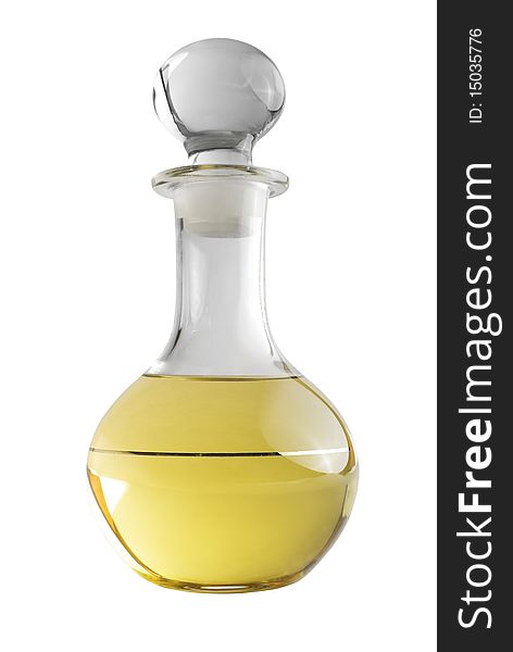 Glass decanter with yellow liquid. Isolated on white background. Glass decanter with yellow liquid. Isolated on white background