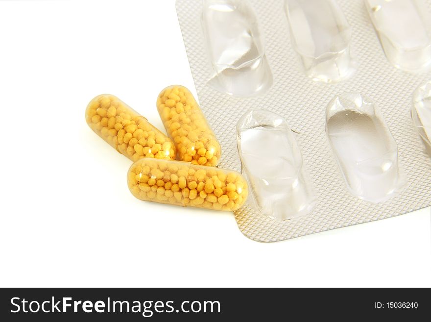 Medical pills in blister on white background, with clipping path