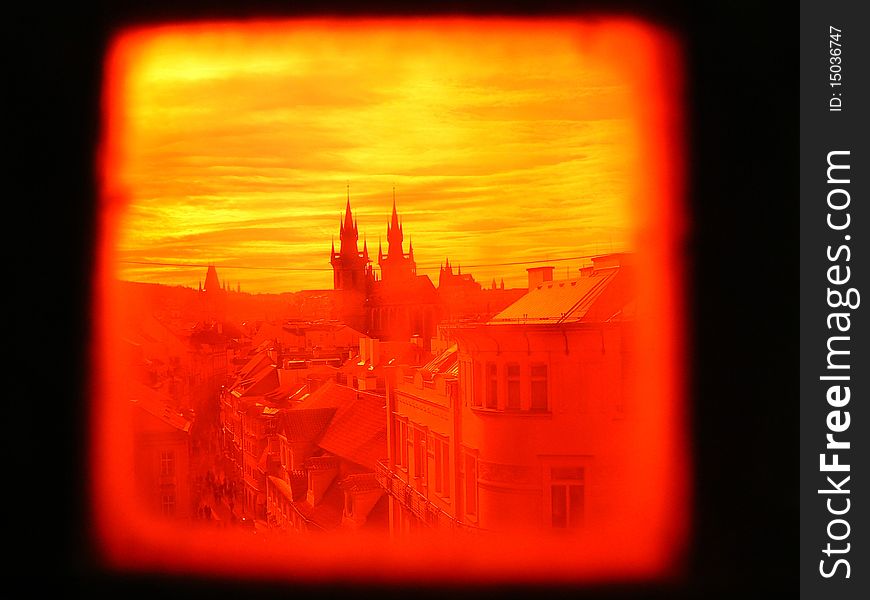 View of Old town Prague through the red window. View of Old town Prague through the red window