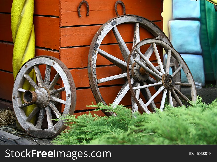 Old wooden wheels of the cart