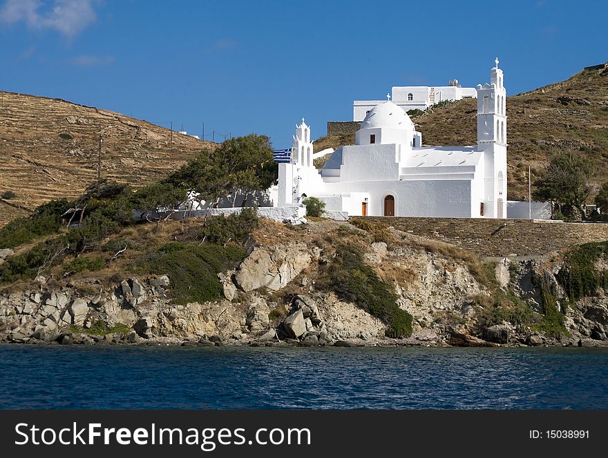 White greek church as you enter Ios from the sea. White greek church as you enter Ios from the sea