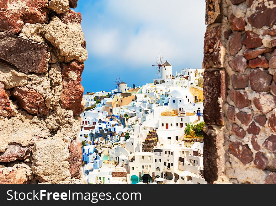 View of Oia town from the Old Castle on Santorini island, Greece. Famous travel destination