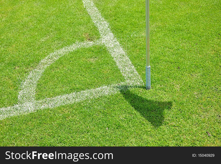 Abstract soccer field corner view.