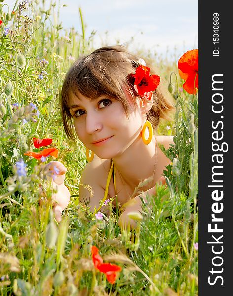 A beautiful girl in the flowers