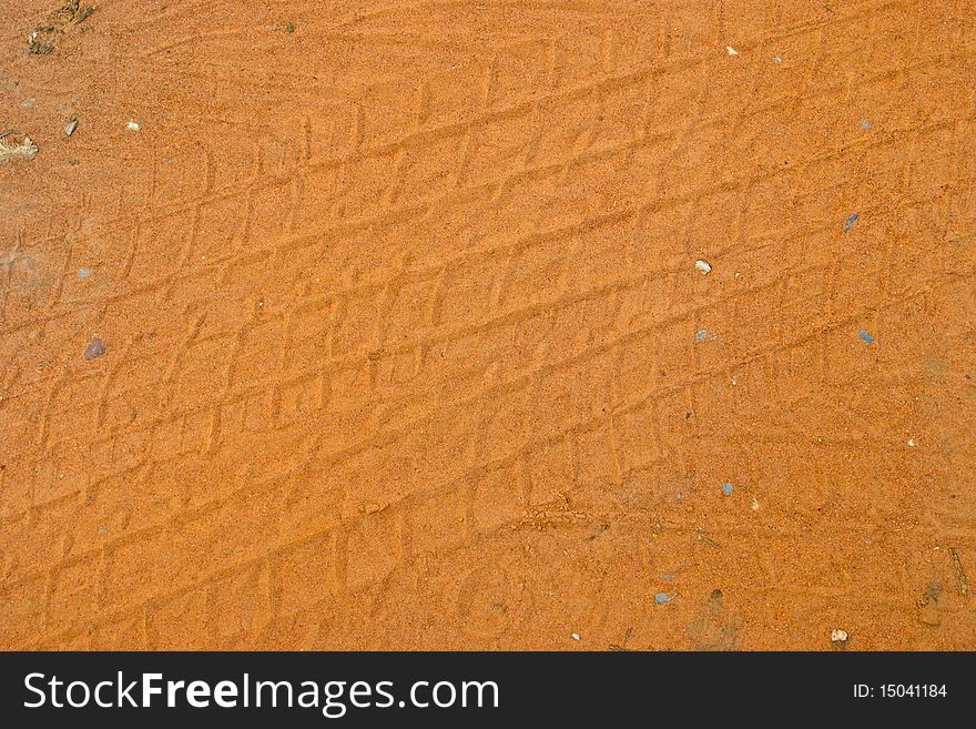 Texture of wheel on sand at floor