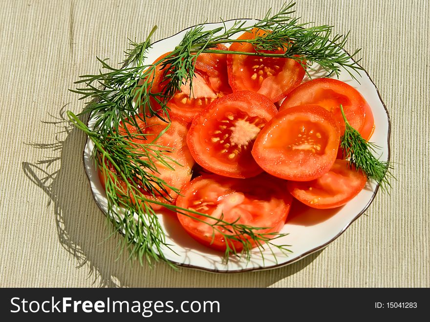 Dish with fresh vegetables, red tomatos and green Fennel