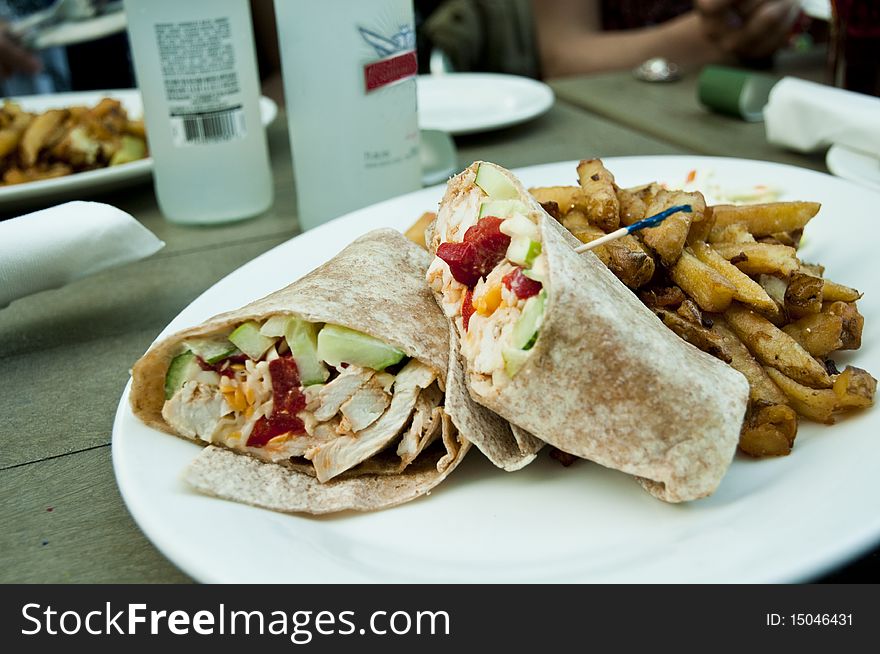 Turkey wrap and french fries. Turkey wrap and french fries