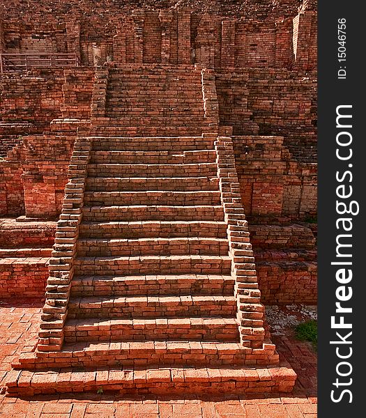 Ruined old stairs in front of Buddhist pagoda, Nakornprathom Thailand