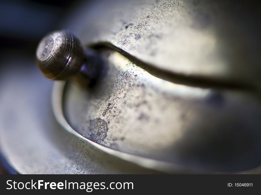 Macro shot of interesting metal thing with patina shallow focus. Macro shot of interesting metal thing with patina shallow focus