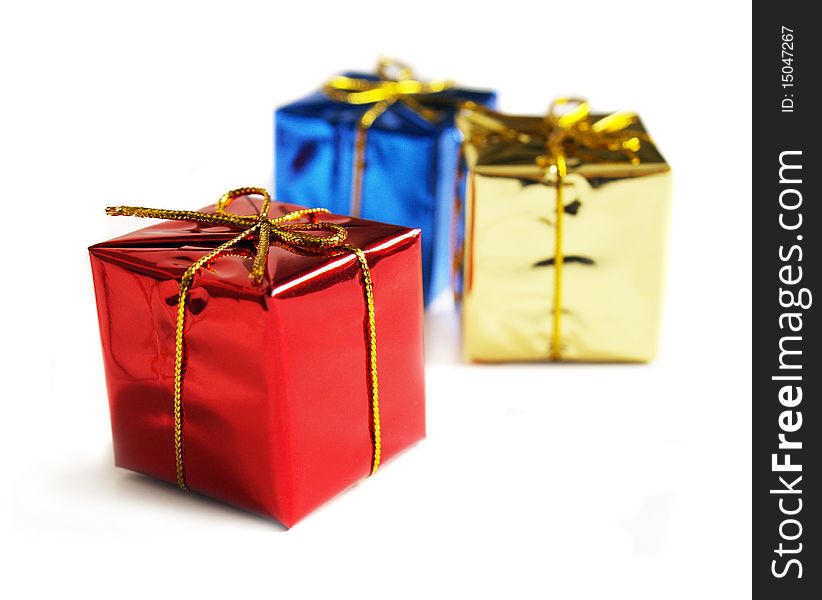 Small gift boxes on a white background. Small gift boxes on a white background