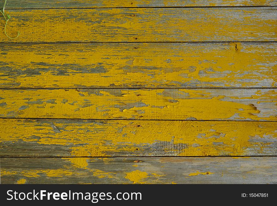 Yellow old plank paint background. Yellow old plank paint background