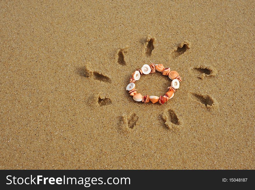 Close-up conch bracelet Sun symbol background. Close-up conch bracelet Sun symbol background