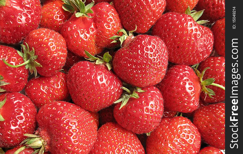 A lot of red strawberrieses (background)