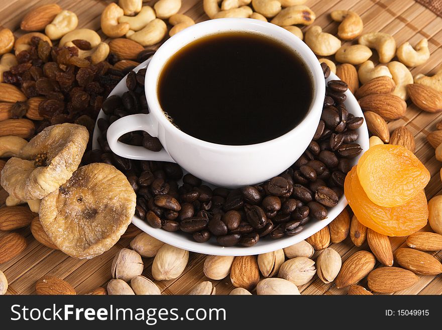 Coffee with nuts, fig and dried apricots