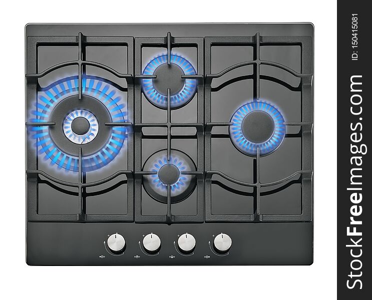 Black gas cook-top with controls and blue fire in four burners on isolated background. Black gas cook-top with controls and blue fire in four burners on isolated background