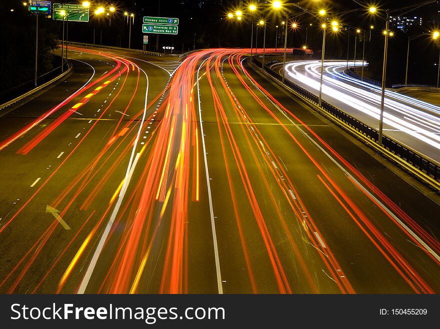 Night traffic in the big city Perth red and white lights on asphalt