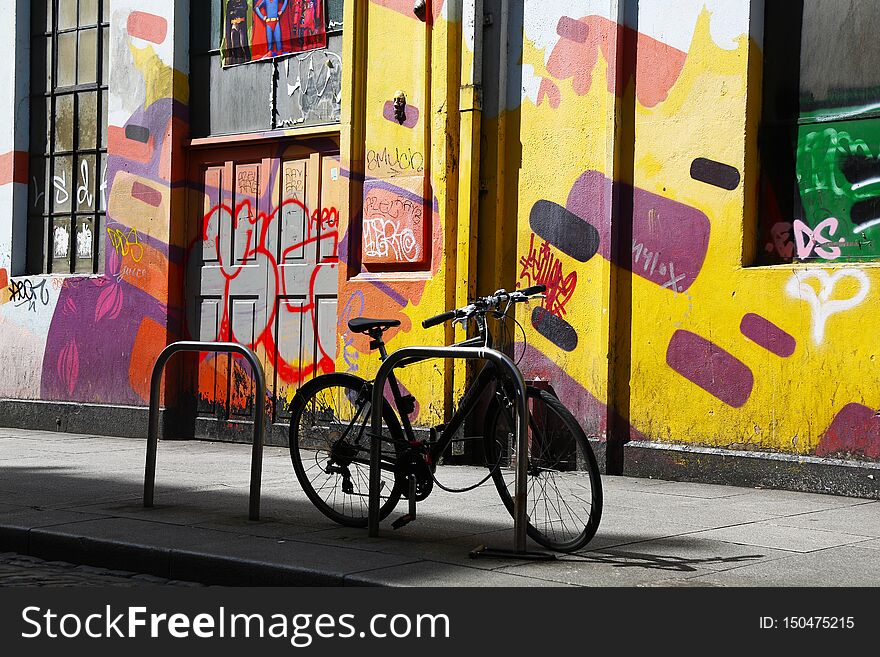 Bicycle on a coloured wall